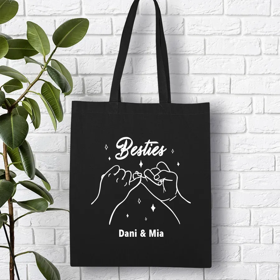 Schwarze Besties-Tasche aus Baumwolle mit kleinem Fingerschwur, Sternchen und zwei individuellen Namen – personalisiertes BFF Geschenk für Freundinnen.